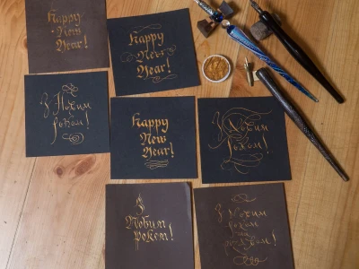 Writing calligraphy, lettering by pen, brush pen, ink