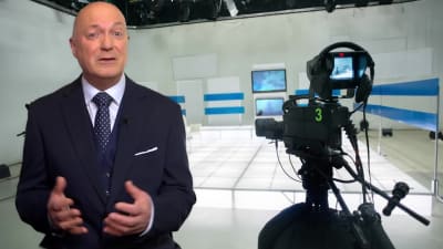 An HD video with me presenting in a Green Screen virtual TV studio