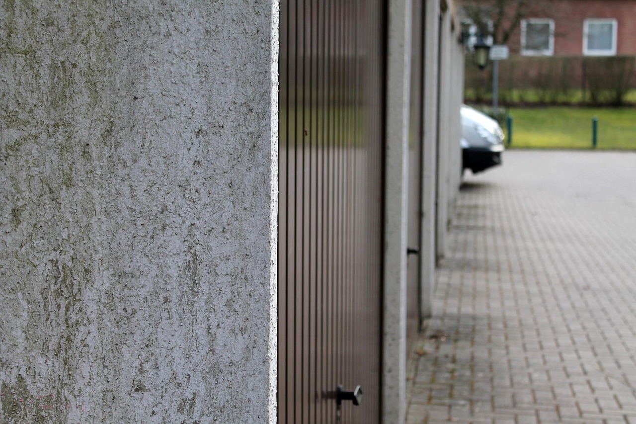 DIY Garage Door Fixes vs. Hiring a Pro: When to Call in the Experts