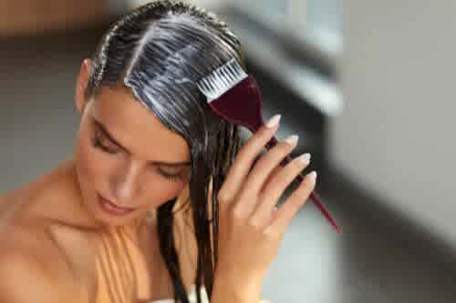 girl applying hair mask