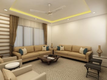 Cream Color Sofa With Color Cushions And False Ceiling By Regalias