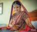 Gold And Gemstone Jewellery With Maroon Lehenga by Kabeer Grover Wedding-photography Bridal-jewellery-and-accessories Bridal-makeup | Weddings Photos & Ideas