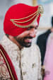 Groom Wearing Elegant Trendy Red Turban With Kilangi Brooch by Camera Waale Baraati Wedding-photography Groom-wear-and-accessories | Weddings Photos & Ideas