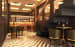 Deluxe Bar With Black Round Frame Chairs by Parvez Alam Modern | Interior Design Photos & Ideas