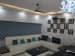 Basic Living Room with L Shaped White Sofa and Blue Wall Art by Ar. Barkha Jain Living-room Modern | Interior Design Photos & Ideas