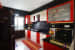 Red And White Themed Modular Kitchen with Black Marbles by Snigdha Ghosh Modular-kitchen Contemporary | Interior Design Photos & Ideas