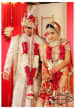 Bride Wearing Red And Golden Gemstone Bridal Set by Preeti Sharma Wedding-photography Bridal-jewellery-and-accessories Groom-wear-and-accessories | Weddings Photos & Ideas