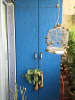 Blue Wooden Cabinet with Hanging Plants by Viraf Laskari Open-spaces Contemporary | Interior Design Photos & Ideas