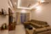 Living Room With L-Shaped Sofa And Modern False Ceiling by Furdo.com Living-room Contemporary | Interior Design Photos & Ideas