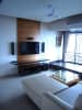 Living Room with TV Unit Hinged to Wooden Panel and Glass Top Table by Reginald Adams Living-room Modern | Interior Design Photos & Ideas