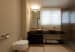 Beige color Bathroom Area with wooden flooring by Regalias Interiors Bathroom Modern | Interior Design Photos & Ideas