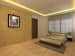 Wooden flooring bedroom with wall decor and false ceiling by Regalias Interiors Bedroom Contemporary | Interior Design Photos & Ideas