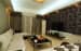 Living Room With White Sectional Sofas And Black Floral Patterned Tiles by HOC Designarch Living-room Contemporary | Interior Design Photos & Ideas