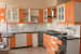 Orange And White Themed Modular Kitchen by VJP. DECORS Modular-kitchen Contemporary | Interior Design Photos & Ideas