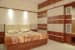 Modern bedroom with king sized bed and wardrobe by Amrath Acharya Bedroom Contemporary | Interior Design Photos & Ideas