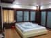 Bedroom with Wooden Flooring and White Cabinets by Ramana Rao P V Bedroom Modern | Interior Design Photos & Ideas