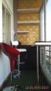 Sitting Space in Balcony with Red Oslo Chair by Ramana Rao P V Open-spaces Modern | Interior Design Photos & Ideas
