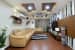 Cream color sofa with false ceiling and wooden flooring by Ramana Rao P V Living-room Modern | Interior Design Photos & Ideas