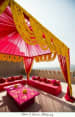 Pink Seating Arrangement With Marigold Decorations by Rashmi Wedding-photography Wedding-decor | Weddings Photos & Ideas