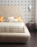 Beige Cushioned Bed with Accent Wall and wooden flooring by Mayank Manchanda Bedroom Modern | Interior Design Photos & Ideas
