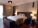 King Size Bed with Wood Flooring and black Bedroom Bench by Mayank Manchanda Bedroom Minimalistic | Interior Design Photos & Ideas
