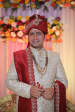 Groom Wearing Red Silk Turban With Gold Kilangi Brooch by Virendra Kumar Wedding-photography Groom-wear-and-accessories | Weddings Photos & Ideas