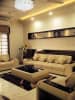 Living Room With Brown Finely Stitched Sofas by Ravi Gulati Living-room Contemporary | Interior Design Photos & Ideas