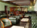 Large And Cozy Bar With Leather Sofa And Marble Floor by Tribuz Interiors Pvt. Ltd. Contemporary | Interior Design Photos & Ideas