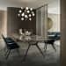 Brown Themed Dining Room With Brown Granite Table and BlackChairs by Manvi Jain Dining-room Modern | Interior Design Photos & Ideas