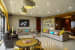 Eclectic living room with Sectional glossy grey sofas and hanging lamps by Gocosy.com Living-room Eclectic | Interior Design Photos & Ideas