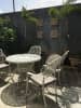 Open Veranda With White Shaded Table by Shreyansh Raghuvanshi Open-spaces Minimalistic | Interior Design Photos & Ideas