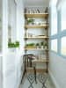 Corner Shelf With Brown Chair by Live Fabulous Open-spaces Modern | Interior Design Photos & Ideas