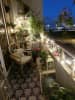 Customized Balcony With Fairy lights And Vines by Live Fabulous Open-spaces Modern | Interior Design Photos & Ideas