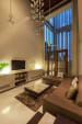 Brown Sofas And Golden Cushions In A Contemporary Living Space by narayan moorthy Living-room Contemporary | Interior Design Photos & Ideas