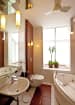 Bathroom With White Sanitary Ware And Cylindrical Light by narayan moorthy Bathroom Contemporary | Interior Design Photos & Ideas