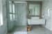 Bathroom With Wooden White Cabinets And Glass Shower Enclosure by narayan moorthy Bathroom Contemporary | Interior Design Photos & Ideas