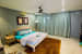 Pine Oak Wooden Bed And Brown Soft Carpet by Dhwani Patel Bedroom Contemporary | Interior Design Photos & Ideas
