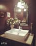 Bathroom basin area with sophisticated design with crystal mirror framework by The Kotri Bathroom Contemporary | Interior Design Photos & Ideas