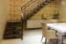 Step Down Staircase With Beige Wallpaper by GC Design Studio Indoor-spaces Modern | Interior Design Photos & Ideas