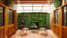 Outside Space with Wall Garden and glass Top Table with Chairs by Monnaie Architects Open-spaces Contemporary | Interior Design Photos & Ideas