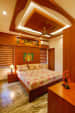 Wooden Themed Bedroom with Queen Size Bed and Marble Flooring by Monnaie Architects Bedroom Contemporary | Interior Design Photos & Ideas