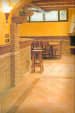 Marble Finished Bar with Brick Textured Walls by Mauve & Crimson Interior Solutions Contemporary | Interior Design Photos & Ideas