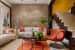 Beige Abstract Wall And Cream Sofas With Patterned Cushions And Orange Lounge Chair by Dhaval Patel Living-room Modern | Interior Design Photos & Ideas