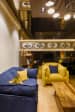 Artistic Living Area With Bright Colors and Wooden Furniture by Dhaval Patel Living-room Eclectic | Interior Design Photos & Ideas