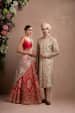 Red Lehenga With White Net Dupatta And Golden Sherwani by Shyamal & Bhumika Wedding-dresses Groom-wear-and-accessories | Weddings Photos & Ideas