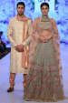 Heavily Embroidered Blue Lehenga And Peach Off White Sherwani by Shyamal & Bhumika Wedding-dresses Groom-wear-and-accessories | Weddings Photos & Ideas
