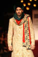 Golden Embroided Sherwani with Emerald Green Turban by Shyamal & Bhumika Groom-wear-and-accessories | Weddings Photos & Ideas