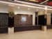 Brown themed decorations with tradition carvings on Dark wooden panels illuminated by LED ceiling lights by Sunil Krera Eclectic | Interior Design Photos & Ideas
