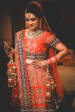Bride All Ready For Her Wedding Day In A Red And Blue Lehenga With Zari Work by Gautam Khullar Bridal-jewellery-and-accessories Wedding-photography Wedding-dresses Bridal-makeup | Weddings Photos & Ideas