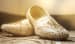 A Shot Of The Groom's Gold And White Juttis For His Wedding Day by Gautam Khullar Wedding-photography Groom-wear-and-accessories | Weddings Photos & Ideas